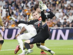Dukungan Real Madrid di Tengah Konflik Membantu Andriy Lunin Perpanjang Kontrak: Kisah Penjaga Gawang Ukraina di Puncak Champions League