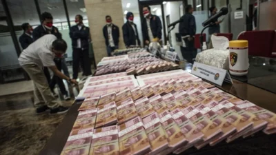 Skandal Dolar Palsu ‘Macau’: Bareskrim Ungkap Sindikat, Modus Penipuan Tangerang, dan Kontroversi Jurnalis Transgender di Macau